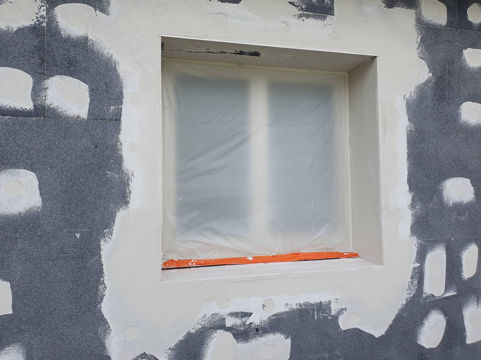 Installation de ITE enduit mince à Forges-les-Eaux